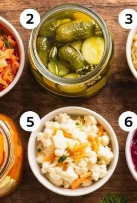 Variety of colorful fermented veggies in jars for healthy living
