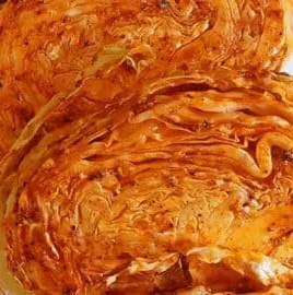 Air fryer cabbage steaks seasoned and ready to eat
