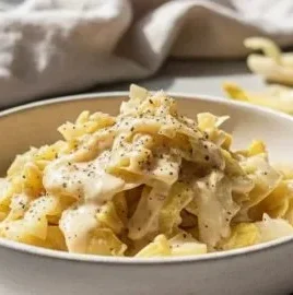 Delicious Alfredo Cabbage dish featuring creamy sauce and vibrant ingredients.