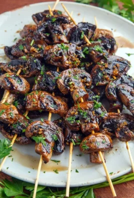 Delicious balsamic garlic grilled mushroom skewers ready for the barbecue