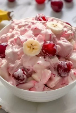 Delicious Better Than Sex Fruit Salad with fresh fruits served in a bowl.