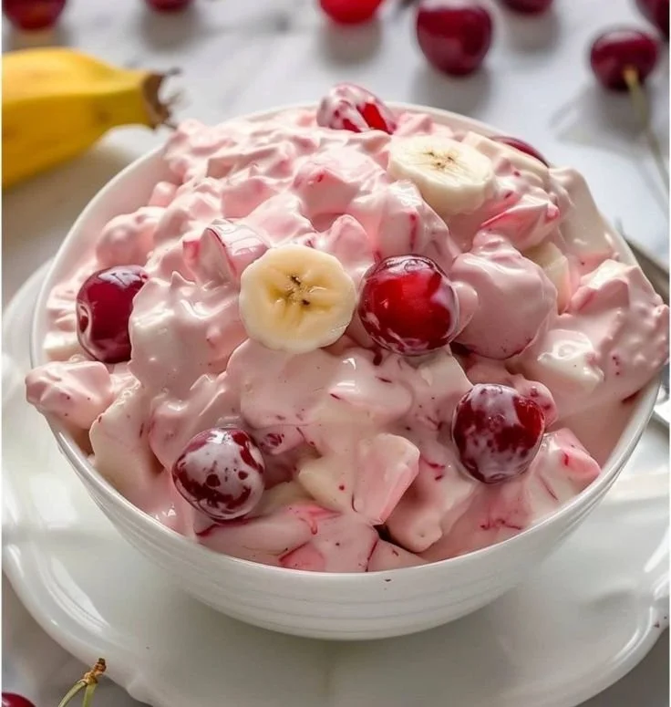 Delicious Better Than Sex Fruit Salad with fresh fruits served in a bowl.