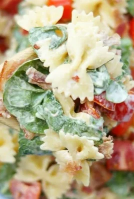 Delicious BLT Pasta Salad with bacon, lettuce, tomatoes, and pasta.