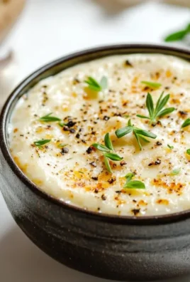 Cajun garlic butter sauce with cream, herbs, served with seafood and pasta