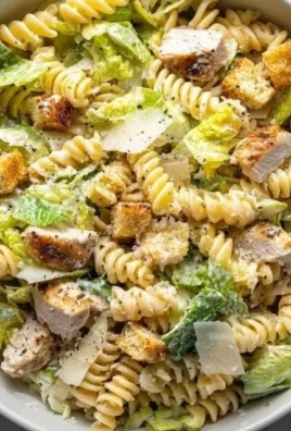 Delicious Chicken Caesar Pasta Salad with chicken, romaine, and Caesar dressing
