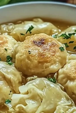 Cozy cabbage dumplings served on a plate with dipping sauce
