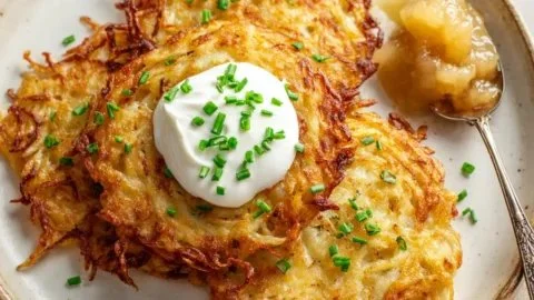 Crispy authentic German potato pancakes served with applesauce and sour cream