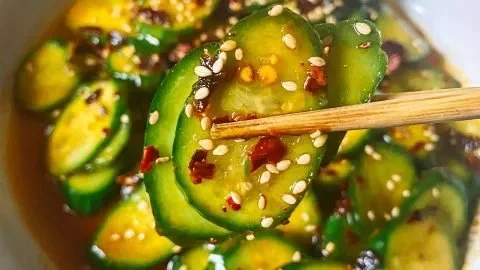 Easy Asian cucumber salad with fresh vegetables and dressing