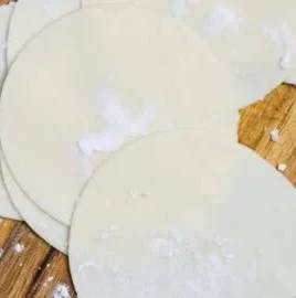 Homemade gyoza wrappers ready for filling and cooking