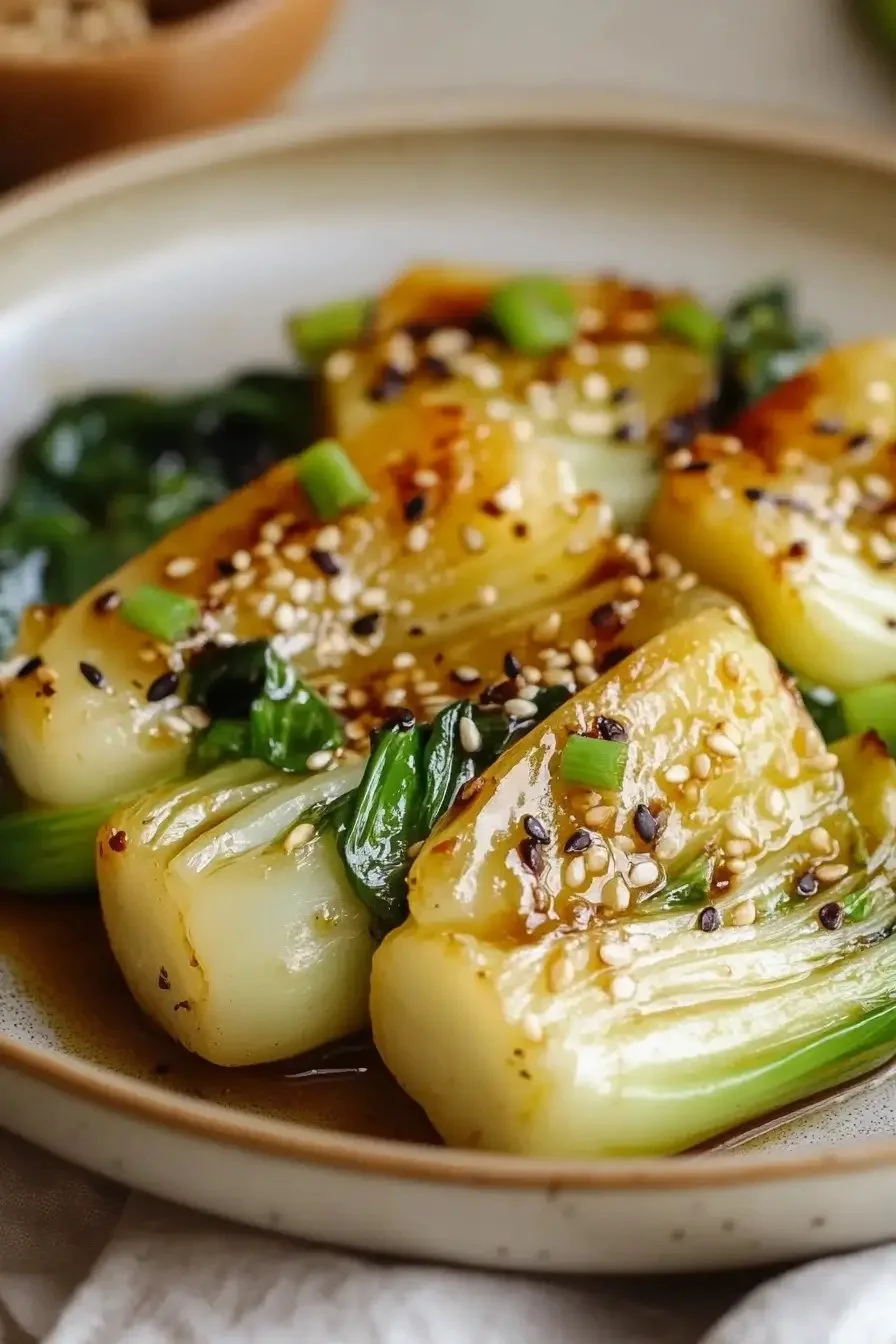 Garlic and Soy Glazed Pan-Seared Bok Choy in a vibrant dish