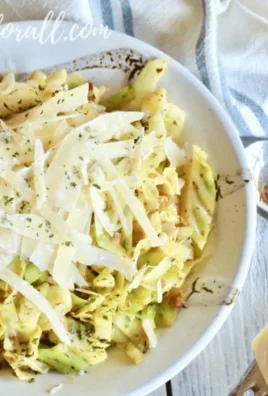 Delicious Garlic Butter Cabbage Noodles served in a bowl with fresh herbs