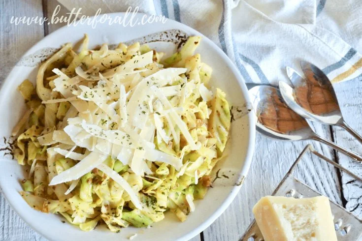 Delicious Garlic Butter Cabbage Noodles served in a bowl with fresh herbs