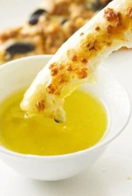 Delicious garlic butter sauce drizzled over cooked pasta and seafood.
