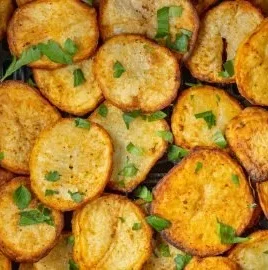 Delicious golden sliced potatoes cooked in an air fryer