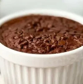 Gooey chocolate high-protein baked oats topped with Greek yogurt