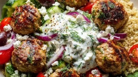 Delicious Greek Turkey Meatball Bowls served with fresh vegetables and sauce