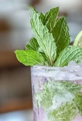 Refreshing Lavender Mojito Mocktail with mint and lavender garnish.