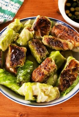 Plate of low-carb cabbage dumplings garnished and ready to serve