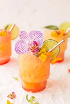Vibrant Pineapple Mango Rum Punch in a stylish glass with tropical garnishes