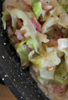 Delicious Quick Cabbage Alfredo Skillet garnished with parsley