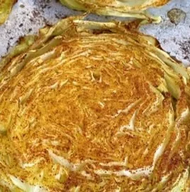 Delicious roasted cabbage steaks served on a plate