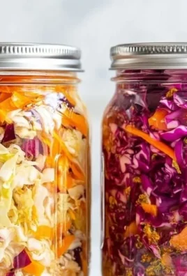 Bowl of homemade sauerkraut with tomatoes and spices, showcasing its texture and color.