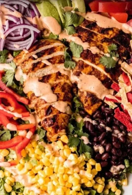 Spicy Southwest Avocado Chicken Salad with greens, chicken, and avocados