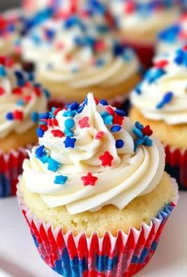 4th of July mini cupcakes decorated in red, white, and blue