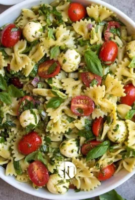Delicious Bow Tie Pasta Salad with fresh vegetables and dressing