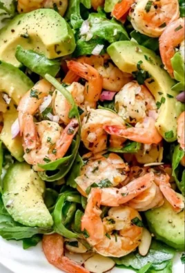 Delicious Citrus Shrimp Salad with avocado and vibrant vegetables