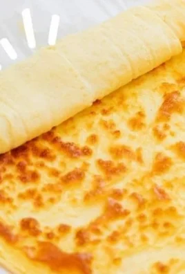 Cottage Cheese and Egg Wrap served on a plate with fresh vegetables