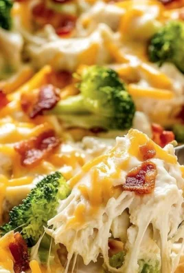 A delicious creamy low carb chicken casserole topped with cheese and herbs