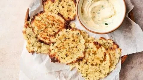 Crispy cottage cheese chips served in a bowl, a healthy snack option.