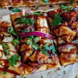 Delicious easy BBQ chicken flatbread topped with fresh ingredients