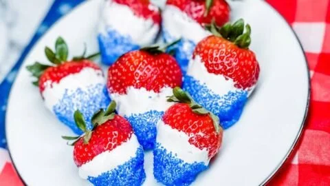 Easy dessert of strawberries, blueberries, and whipped cream for festive occasions