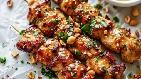 Easy grilled chicken skewers with honey garlic sauce on a plate