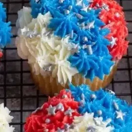 Colorful firework cupcakes decorated for festive celebrations.
