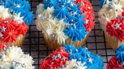 Colorful firework cupcakes decorated for festive celebrations.