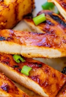 Delicious Grilled Aloha Chicken served with colorful pineapple and veggies