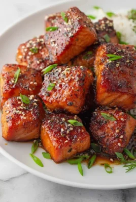 Delicious honey garlic salmon bites served on a platter