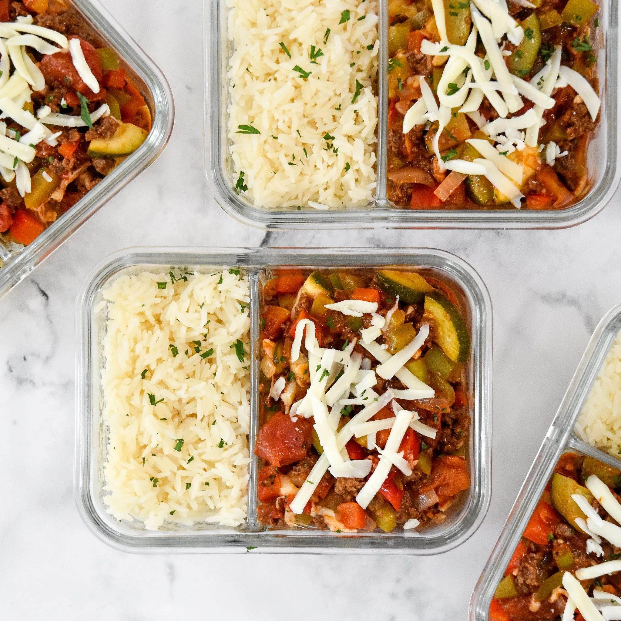 Colorful unstuffed pepper bowls filled with rice, veggies, and spices