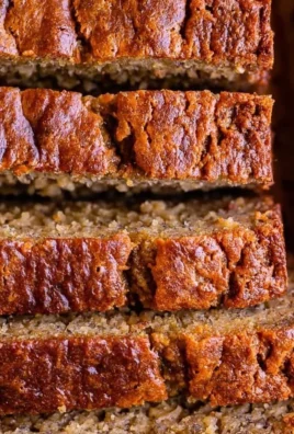 Moist banana bread made with sour cream, a delicious and fluffy baked treat.