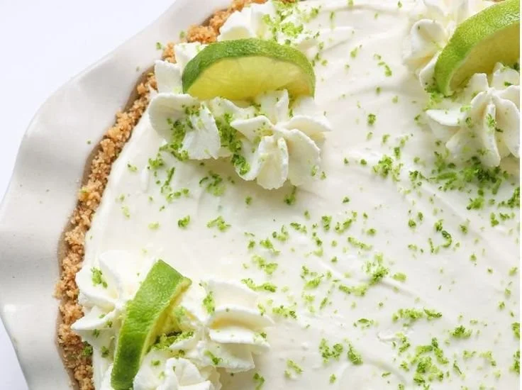 No Bake Key Lime Pie with a graham cracker crust and lime garnish
