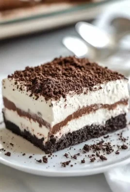Delicious no bake Oreo lasagna dessert with creamy layers and crushed cookies
