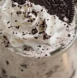 Delicious Oreo no-bake cheesecake cups topped with crushed Oreos