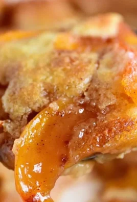 Delicious homemade peach cobbler with fresh peaches and golden crust
