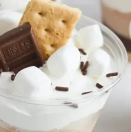 Delicious S'mores pudding parfait with layers of chocolate and marshmallows.
