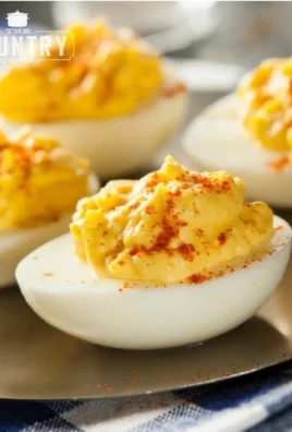 Delicious plate of the best ever deviled eggs garnished with paprika