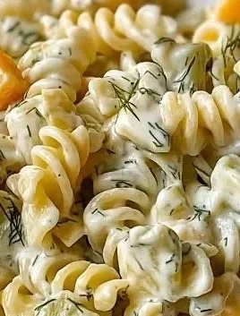Zesty dill pickle pasta salad served in a bowl for summer gatherings