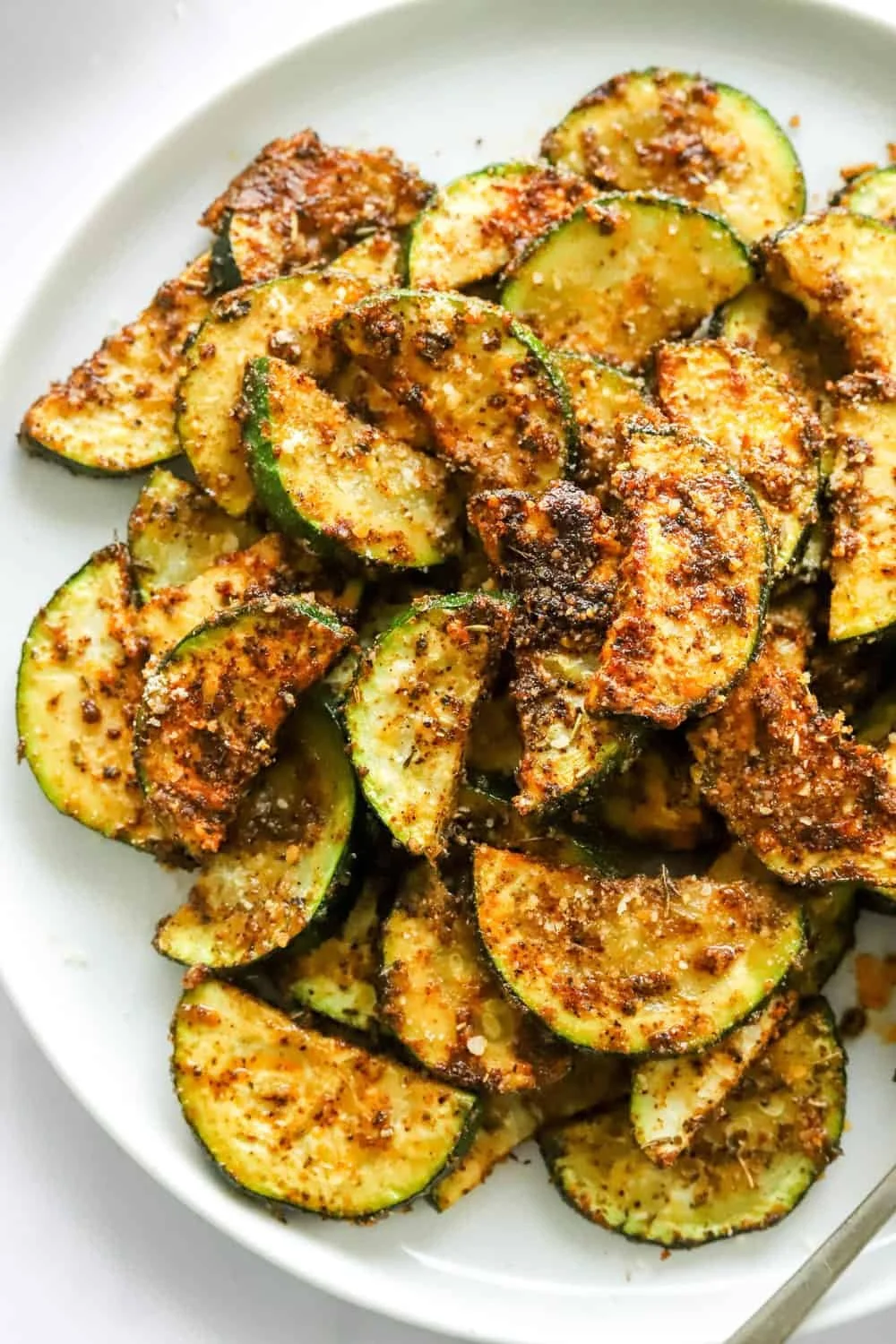 Delicious air fryer zucchini slices, gluten-free and perfectly crispy.